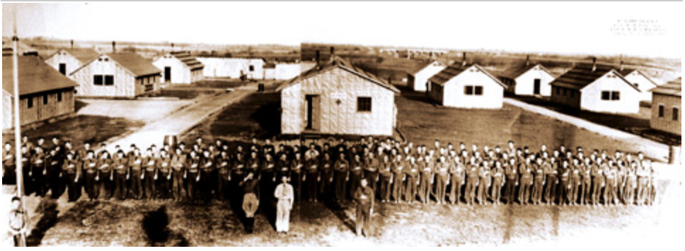 Enrollees stand at attention in 1936 at their camp near Mesquite